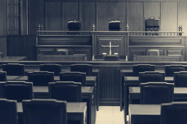 An empty wood-panelled courtroom